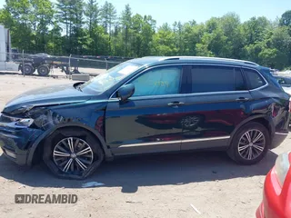 2018 Volkswagen Tiguan SEL with VIN 3VV2B7AX9JM058518, listed as a IAAI auction lot 42558129 with 82,807 mi miles and . Bid and sale history available at DreamBid. Image 14.