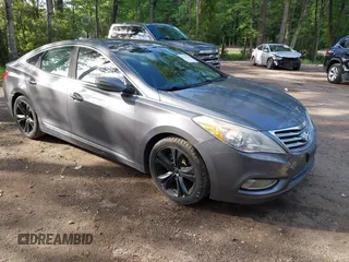 2013 Hyundai Azera with VIN KMHFH4JG7DA323379, listed as a IAAI auction lot 42770536 with 159,920 mi miles and . Bid and sale history available at DreamBid. Image 1.