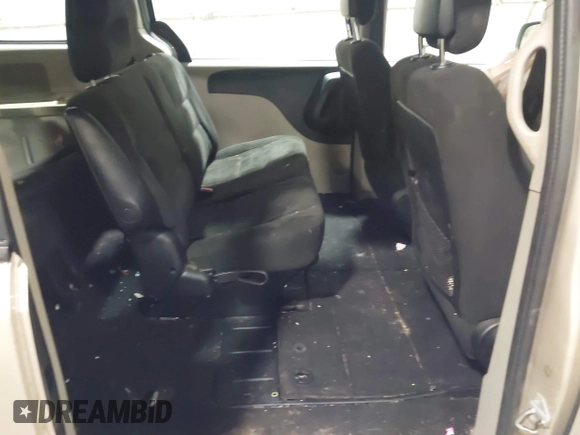 2015 Dodge Grand Caravan SE with VIN 2C4RDGBG2FR592899, listed as a IAAI auction lot 41309499 with 110,428 mi miles and . Bid and sale history available at DreamBid. Image 8.
