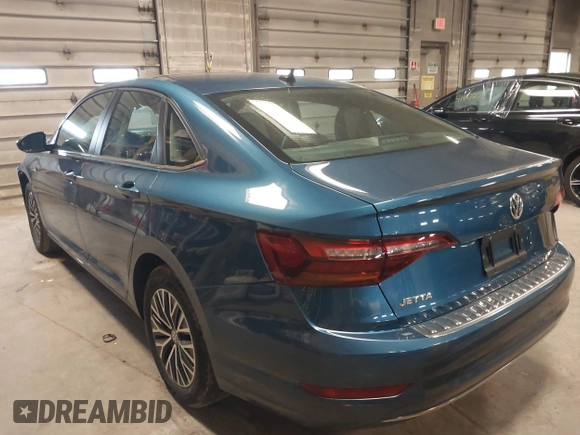 2019 Volkswagen Jetta SEL z VIN 3VWE57BU2KM116717, wystawiony jako IAAI lot #41951428 z przebiegiem 85 791 mil mil oraz . Historia ofert i sprzedaży dostępna na DreamBid. Obrazek 3.