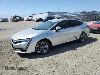 2018 Honda Clarity z VIN JHMZC5F11JC022308, wystawiony jako Copart lot #50257055 z przebiegiem 59 974 mil mil oraz Szkoda całkowita • Salvage title. Historia ofert i sprzedaży dostępna na DreamBid. Obrazek 1.