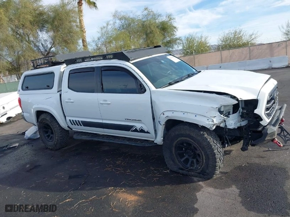 2019 Toyota Tacoma 4WD SR with VIN 3TMCZ5AN6KM284101, listed as a IAAI auction lot 41099466 with 36,119 mi miles. Bid and sale history available at carsss.com. Image 13.