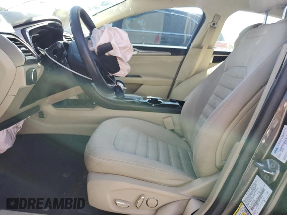 2016 Ford Fusion SE Hybrid with VIN 3FA6P0LU3GR307666, listed as a Copart auction lot 57444365 with 127,786 mi miles and Salvage title. Bid and sale history available at DreamBid. Image 7.
