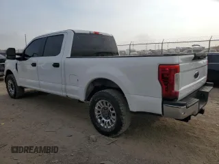 2019 Ford Super Duty F-250 SRW XL with VIN 1FT7W2A68KEE62694, listed as a Copart auction lot 82036854 with 153,678 mi miles and Salvage Title. Bid and sale history available at carsss.com. Image 2.