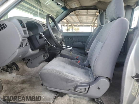 1998 Nissan Frontier XE with VIN 1N6DD26S8WC370482, listed as a Copart auction lot 52017845 with 46,572 mi miles and Salvage title. Bid and sale history available at DreamBid. Image 7.
