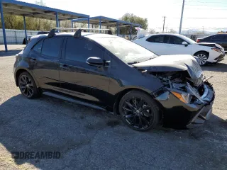 2022 Toyota Corolla Hatchback SE with VIN JTND4MBE2N3189211, listed as a Copart auction lot 49585075 with 30,486 mi miles and Salvage Title. Bid and sale history available at carsss.com. Image 4.