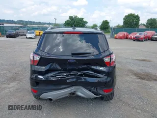 2018 Ford Escape Titanium z VIN 1FMCU9J9XJUB66275, wystawiony jako IAAI lot #42757952 z przebiegiem 97 629 mil mil oraz . Historia ofert i sprzedaży dostępna na DreamBid. Obrazek 6.