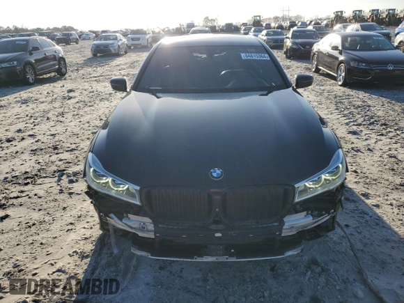 2016 BMW 7 Series 750i with VIN WBA7F0C5XGGL99048, listed as a Copart auction lot 84815364 with 96,743 mi miles and Salvage Title. Bid and sale history available at carsss.com. Image 5.