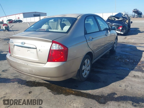 2004 Kia Spectra LX with VIN KNAFE121745039519, listed as a IAAI auction lot 41482402 with 201,123 mi miles. Bid and sale history available at carsss.com. Image 4.