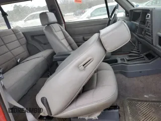 1993 Jeep Cherokee Sport with VIN 1J4FJ67S6PL580133, listed as a Copart auction lot 43230005 with 122,173 mi miles and Salvage Title. Bid and sale history available at carsss.com. Image 11.
