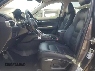 2018 Mazda CX-5 Grand Touring with VIN JM3KFADM3J1389911, listed as a Copart auction lot 60530295 with 103,177 mi miles and Salvage title. Bid and sale history available at DreamBid. Image 7.