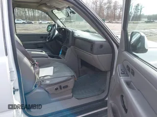 2004 Chevrolet Suburban LT z VIN 1GNFK16T14J103074, wystawiony jako IAAI lot #41501026 z przebiegiem 241 154 mil mil oraz . Historia ofert i sprzedaży dostępna na DreamBid. Obrazek 5.