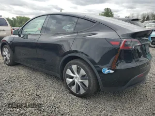 2021 Tesla Model Y Long Range with VIN 5YJYGDEE2MF243763, listed as a Copart auction lot 54941665 with 39,516 mi miles and Clean Title. Bid and sale history available at DreamBid. Image 2.