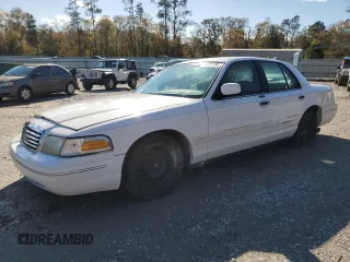 2000 Ford Crown Victoria LX z VIN 2FAFP74W0YX125595, wystawiony jako Copart lot #84675434 z przebiegiem 151 438 mil mil oraz Szkoda całkowita • Salvage title. Historia ofert i sprzedaży dostępna na DreamBid. Obrazek 1.
