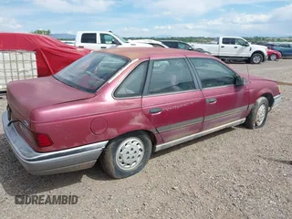 1989 Ford Taurus GL z VIN 1FABP52U9KA278657, wystawiony jako IAAI lot #42349469 z przebiegiem 10 782 mil mil oraz . Historia ofert i sprzedaży dostępna na DreamBid. Obrazek 4.