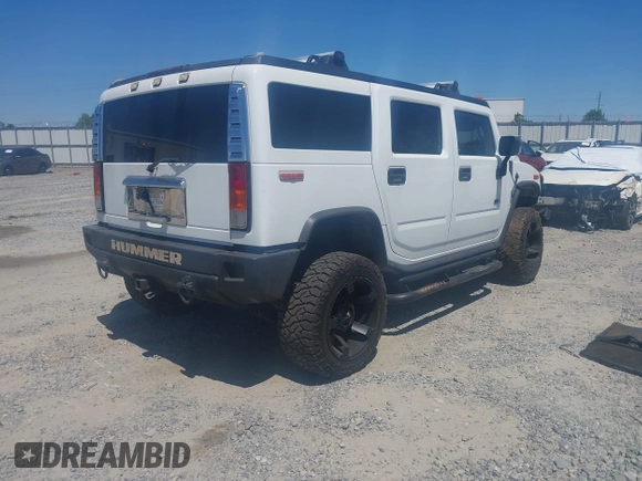 2003 Hummer H2 z VIN 5GRGN23U53H102215, wystawiony jako IAAI lot #42054023 z przebiegiem 222 170 mil mil oraz . Historia ofert i sprzedaży dostępna na DreamBid. Obrazek 4.