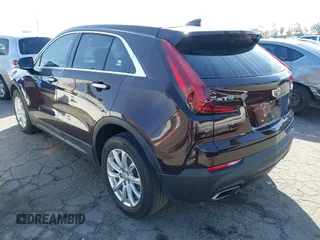 2021 Cadillac XT4 FWD Luxury with VIN 1GYAZAR43MF043816, listed as a IAAI auction lot 41593795 with 36,102 mi miles and . Bid and sale history available at DreamBid. Image 3.