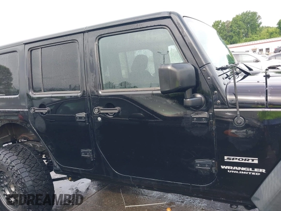 2015 Jeep Wrangler Unlimited Willys Wheeler with VIN 1C4BJWDG4FL687829, listed as a IAAI auction lot 42099147 with 98,969 mi miles and . Bid and sale history available at DreamBid. Image 14.