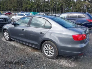 2011 Volkswagen Jetta SE z VIN 3VWDZ7AJXBM356668, wystawiony jako IAAI lot #42294221 z przebiegiem 199 605 mil mil oraz . Historia ofert i sprzedaży dostępna na DreamBid. Obrazek 3.