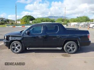 2013 Honda Ridgeline Sport with VIN 5FPYK1F70DB011814, listed as a IAAI auction lot 41689579 with 136,251 mi miles and . Bid and sale history available at DreamBid. Image 14.