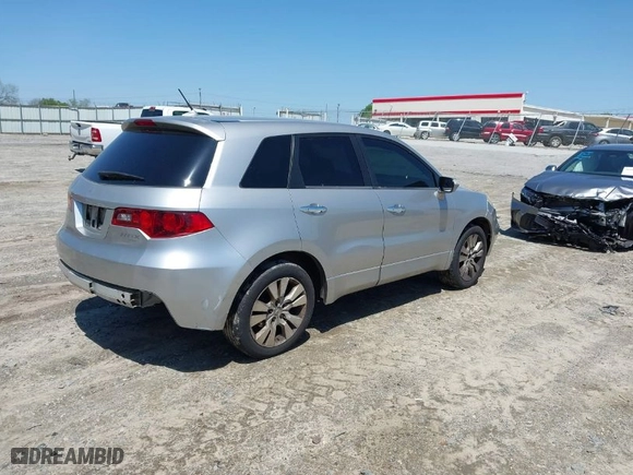 2010 Acura RDX with VIN 5J8TB2H23AA003688, listed as a IAAI auction lot 41995476 with 215,679 mi miles. Bid and sale history available at carsss.com. Image 4.