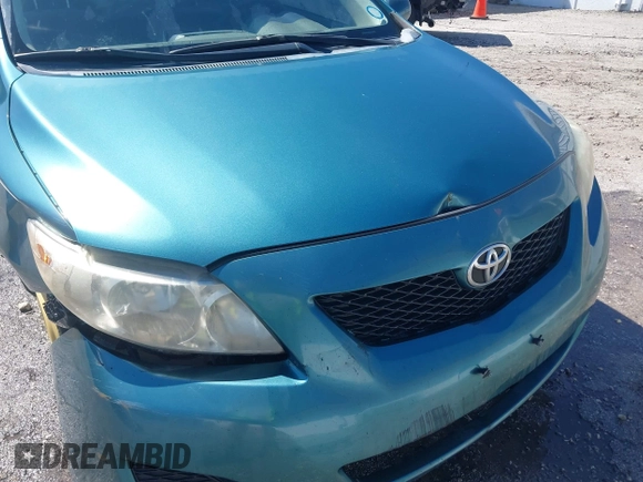 2009 Toyota Corolla with VIN JTDBL40EX99034801, listed as a IAAI auction lot 41943591 with 204,674 mi miles. Bid and sale history available at carsss.com. Image 12.