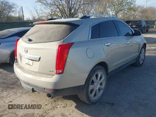 2014 Cadillac SRX Premium Collection with VIN 3GYFNDE37ES574109, listed as a IAAI auction lot 41770404 with 66,478 mi miles and . Bid and sale history available at DreamBid. Image 4.