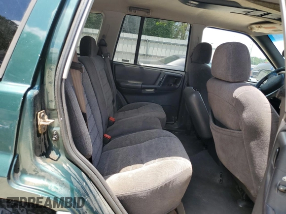 1998 Jeep Grand Cherokee Laredo with VIN 1J4GZ48S5WC289251, listed as a Copart auction lot 63594685 with 156,358 mi miles and Salvage title. Bid and sale history available at DreamBid. Image 11.
