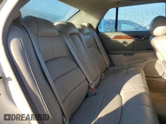 2003 Cadillac DeVille DTS z VIN 1G6KF57963U257494, wystawiony jako Copart lot #84532944 z przebiegiem 104 766 mil mil oraz Szkoda całkowita • Salvage title. Historia ofert i sprzedaży dostępna na DreamBid. Obrazek 10.