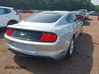 2018 Ford Mustang EcoBoost z VIN 1FA6P8TH6J5174509, wystawiony jako IAAI lot #42627744 z przebiegiem 83 093 mil mil oraz . Historia ofert i sprzedaży dostępna na DreamBid. Obrazek 4.