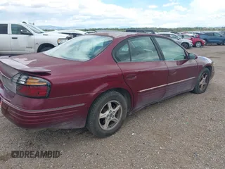 2001 Pontiac Bonneville SE z VIN 1G2HX54K814207144, wystawiony jako IAAI lot #42223805 z przebiegiem 237 762 mil mil oraz . Historia ofert i sprzedaży dostępna na DreamBid. Obrazek 4.