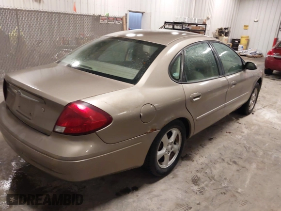 2003 Ford Taurus SES Standard with VIN 1FAFP552X3G184894, listed as a IAAI auction lot 41846677 with 160,824 mi miles. Bid and sale history available at carsss.com. Image 4.