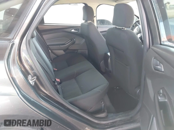 2016 Ford Focus SE with VIN 1FADP3F28GL330815, listed as a IAAI auction lot 41696821 with 125,247 mi miles. Bid and sale history available at carsss.com. Image 8.