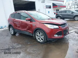2014 Ford Escape Titanium with VIN 1FMCU9J92EUE01077, listed as a IAAI auction lot 41642337 with 26,002 mi miles. Bid and sale history available at carsss.com. Image 1.