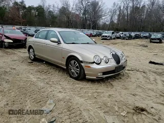 2003 Jaguar S-Type z VIN SAJEA01U33HM71782, wystawiony jako Copart lot #82969304 z przebiegiem 127 176 mil mil oraz Szkody całkowita. Historia ofert i sprzedaży dostępna na DreamBid. Obrazek 10.