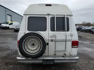 1993 Chevrolet Chevy Van z VIN 1GBEG25K1PF305736, wystawiony jako Copart lot #45422145 z przebiegiem Nie podano mil oraz Nie do naprawy • Non repairable. Historia ofert i sprzedaży dostępna na DreamBid. Obrazek 6.