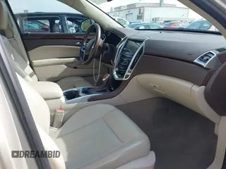 2015 Cadillac SRX Luxury Collection with VIN 3GYFNEE33FS548324, listed as a IAAI auction lot 42029979 with 70,372 mi miles. Bid and sale history available at carsss.com. Image 5.