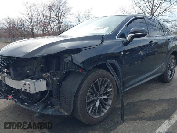 2020 Lexus RX with VIN 2T2SZMDA8LC256854, listed as a IAAI auction lot 41822801 with 74,814 mi miles. Bid and sale history available at carsss.com. Image 18.