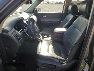 2014 Ford Flex SEL z VIN 2FMGK5C86EBD41038, wystawiony jako Copart lot #55609235 z przebiegiem 157 934 mil mil oraz Szkoda całkowita • Salvage title. Historia ofert i sprzedaży dostępna na DreamBid. Obrazek 7.