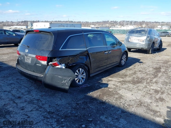2016 Honda Odyssey SE with VIN 5FNRL5H34GB139571, listed as a IAAI auction lot 41602695 with 118,960 mi miles. Bid and sale history available at carsss.com. Image 4.