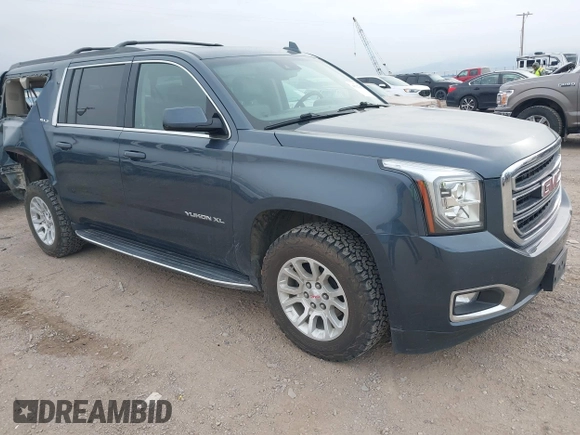 2019 GMC Yukon XL SLT with VIN 1GKS2GKC0KR345860, listed as a IAAI auction lot 40727072 with 127,568 mi miles and . Bid and sale history available at carsss.com. Image 1.