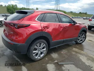 2023 Mazda CX-30 S Carbon Edition with VIN 3MVDMBCM7PM551693, listed as a Copart auction lot 60330865 with 22,557 mi miles and Salvage title. Bid and sale history available at DreamBid. Image 3.