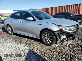 2016 Kia Optima LX with VIN 5XXGT4L35GG037007, listed as a Copart auction lot 52196405 with 165,603 mi miles and Salvage Title. Bid and sale history available at carsss.com. Image 4.