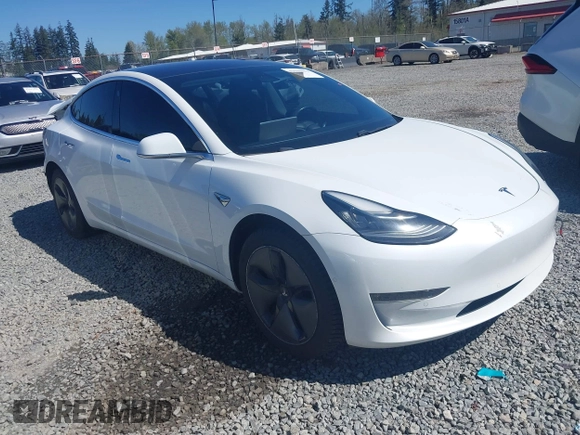 2018 Tesla Model 3 Long Range Battery with VIN 5YJ3E1EA7JF020173, listed as a IAAI auction lot 42046312 with 83,395 mi miles and . Bid and sale history available at DreamBid. Image 1.