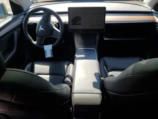 2024 Tesla Model Y Long Range with VIN 7SAYGDEE9RF120729, listed as a Copart auction lot 57360265 with 21,589 mi miles and Salvage title. Bid and sale history available at DreamBid. Image 8.