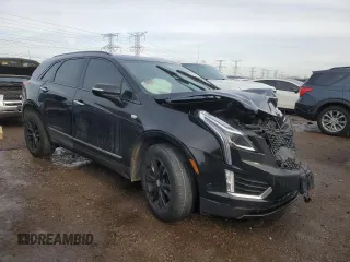2021 Cadillac XT5 AWD Premium Luxury with VIN 1GYKNDRS9MZ141571, listed as a Copart auction lot 46450135 with 92,668 mi miles and Salvage Title. Bid and sale history available at carsss.com. Image 4.