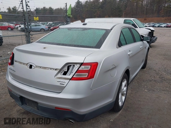 2013 Ford Taurus SEL with VIN 1FAHP2H81DG167605, listed as a IAAI auction lot 41084850 with 85,441 mi miles and . Bid and sale history available at DreamBid. Image 4.