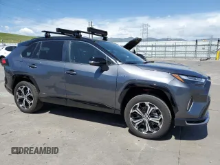 2024 Toyota RAV4 XSE with VIN JTMFB3FV7RD185694, listed as a Copart auction lot 57692835 with 11,900 mi miles and Salvage title. Bid and sale history available at DreamBid. Image 4.