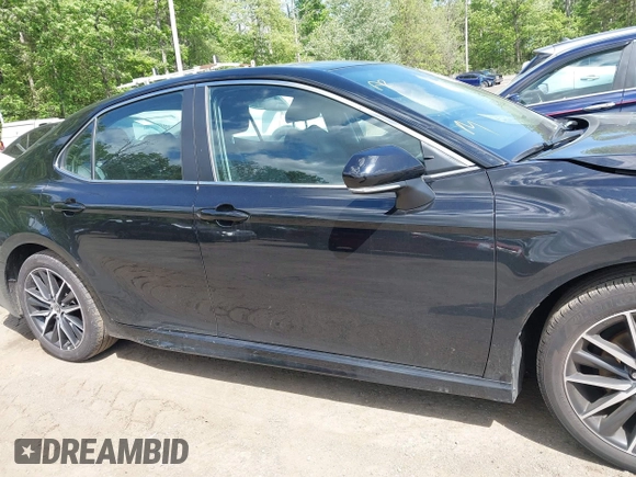 2023 Toyota Camry SE with VIN 4T1G11AK2PU828745, listed as a IAAI auction lot 42193957 with 35,399 mi miles and . Bid and sale history available at carsss.com. Image 13.