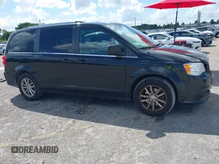 2019 Dodge Grand Caravan SXT with VIN 2C4RDGCG5KR797853, listed as a IAAI auction lot 40332854 with 81,197 mi miles and . Bid and sale history available at DreamBid. Image 13.